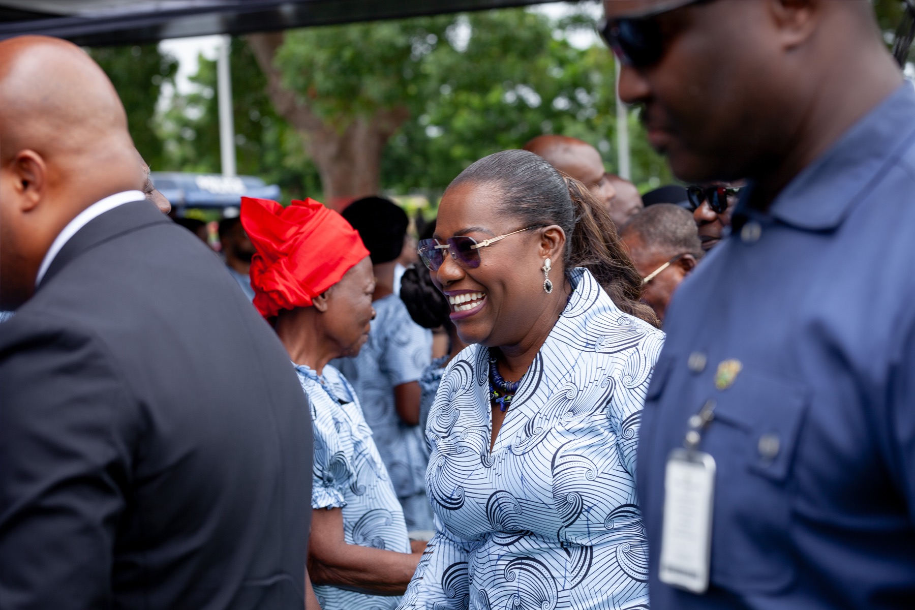 Nana Oye greeting leaders at an outdoor gathering