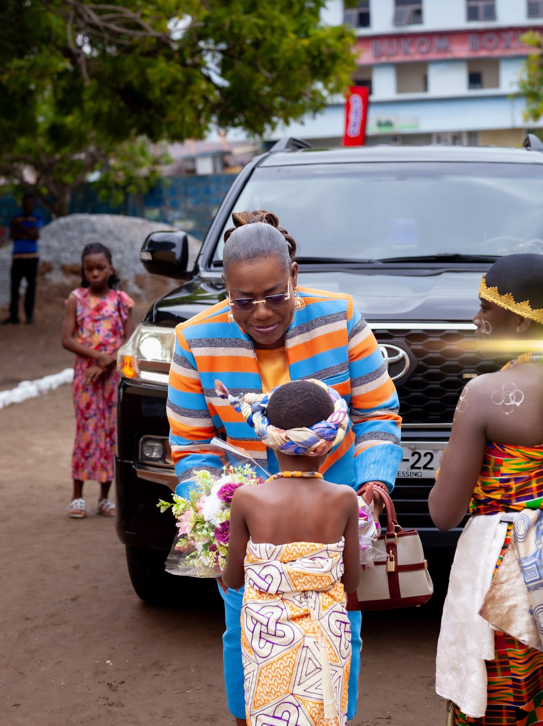 Nana Oye Bampoe Addo with the community